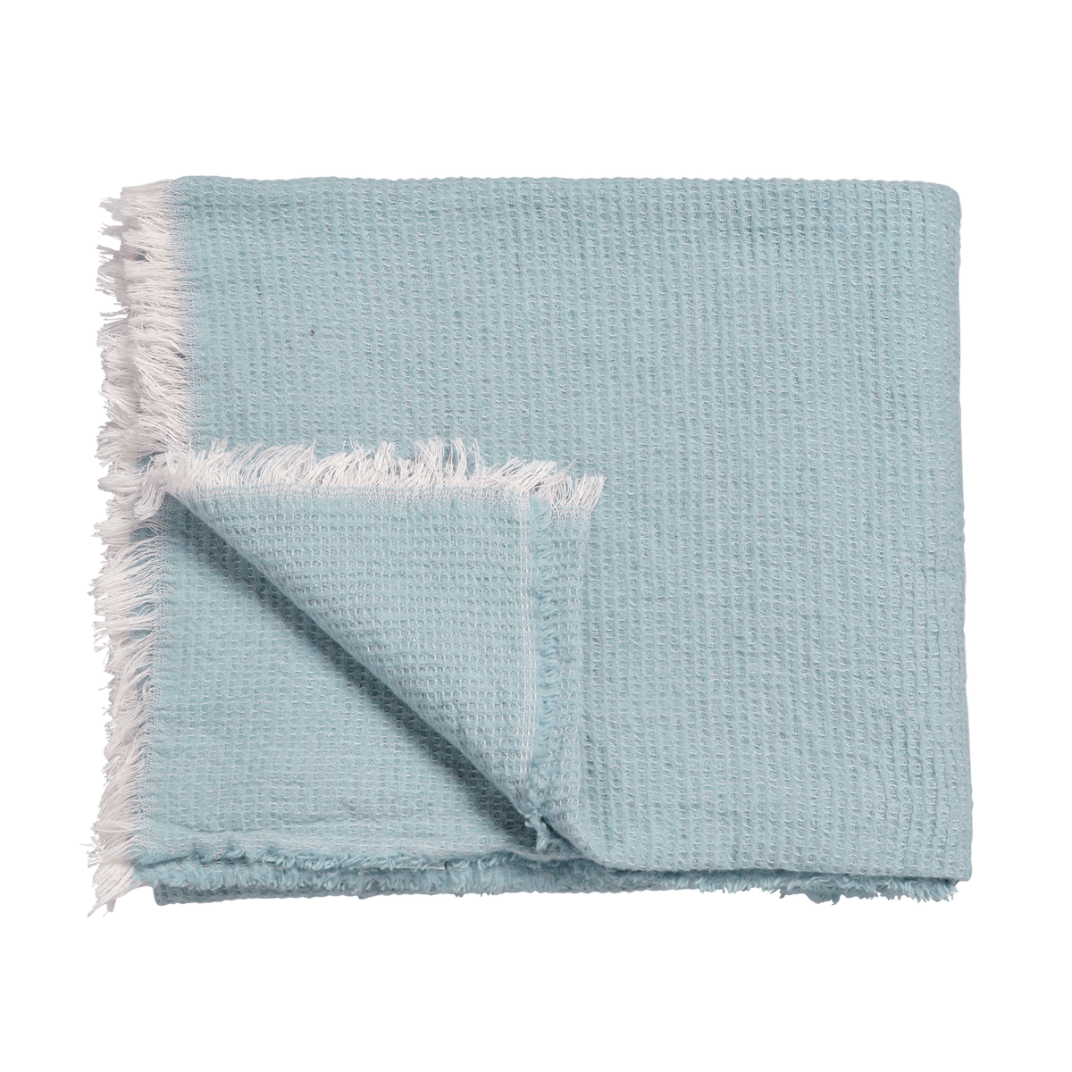 Home 89 plaid in de kleur pearl blue heeft een losse weving met wafelstructuur, de randen zijn afgewerkt met rafels en voelt zacht aan. 